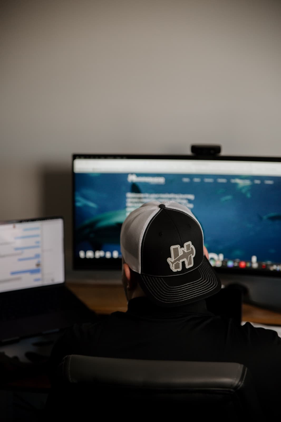 Logan Lewis working on a website design